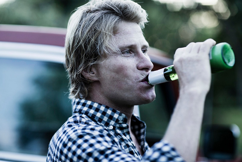 Here's Mark Healey drinking a beer. Purely because the world needs more photos of Mark Healey drinking a beer.